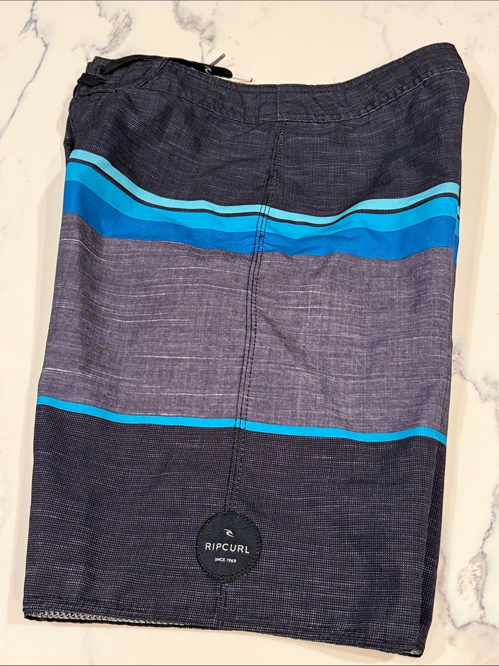 Rip Curl youth boys size 26 black Navy & Bright Blue Striped Board Shorts